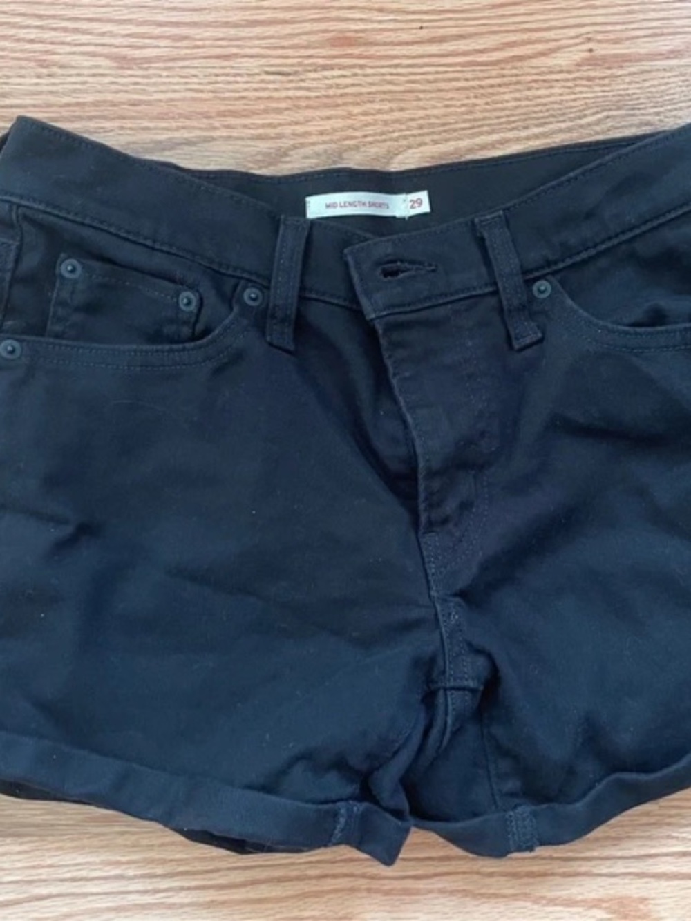 Levi black cuffed mid length shorts